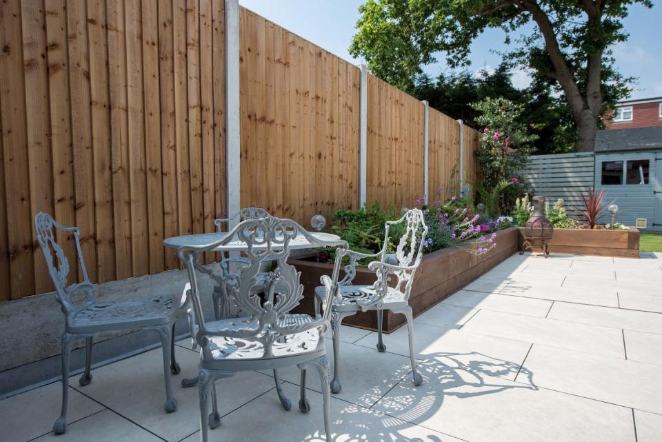 view of patio garden with shrubs