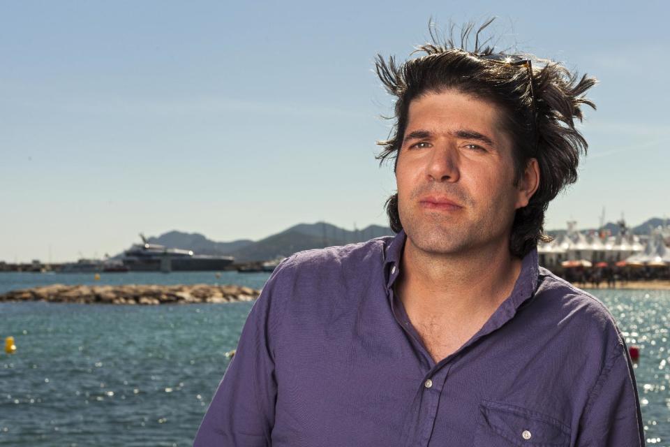 Director JC Chandor poses for portraits at the 66th international film festival, in Cannes, southern France, Thursday, May 23, 2013. (AP Photo/Laurent Emmanuel)