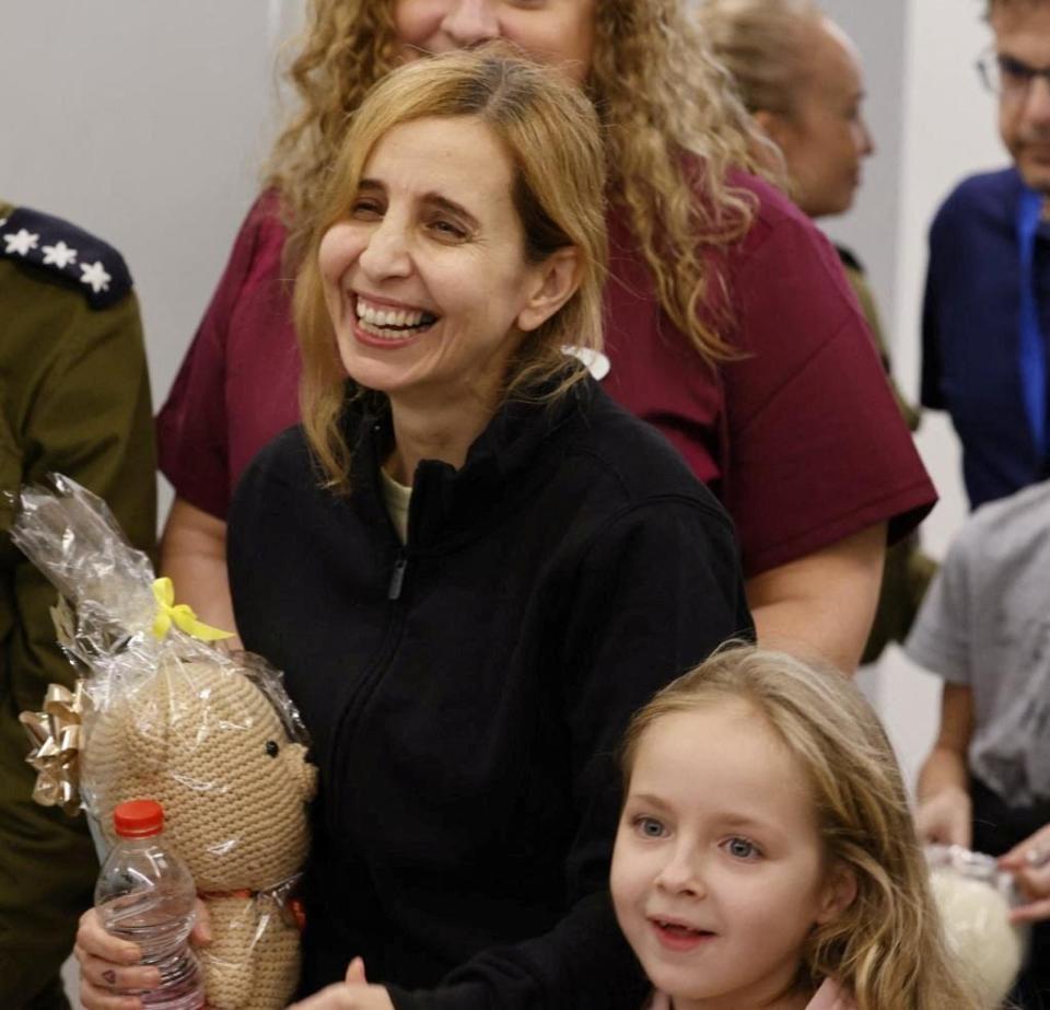 Six year-old Amelia Aloni and her mother Daniel react as they meet their family members after they returned to Israel last night to the designated complex at the Schneider Children's Medical Center, during a temporary truce between Hamas and Israel, in Petah Tikva, Israel November 25, 2023.