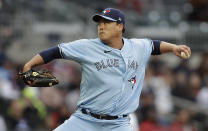 Toronto Blue Jays pitcher Hyun Jin Ryu works against the Atlanta Braves during the first inning of a baseball game Wednesday, May 12, 2021, in Atlanta. (AP Photo/Ben Margot)