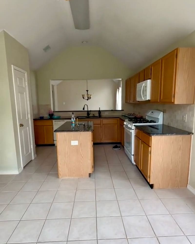 Empty kitchen before renovation.