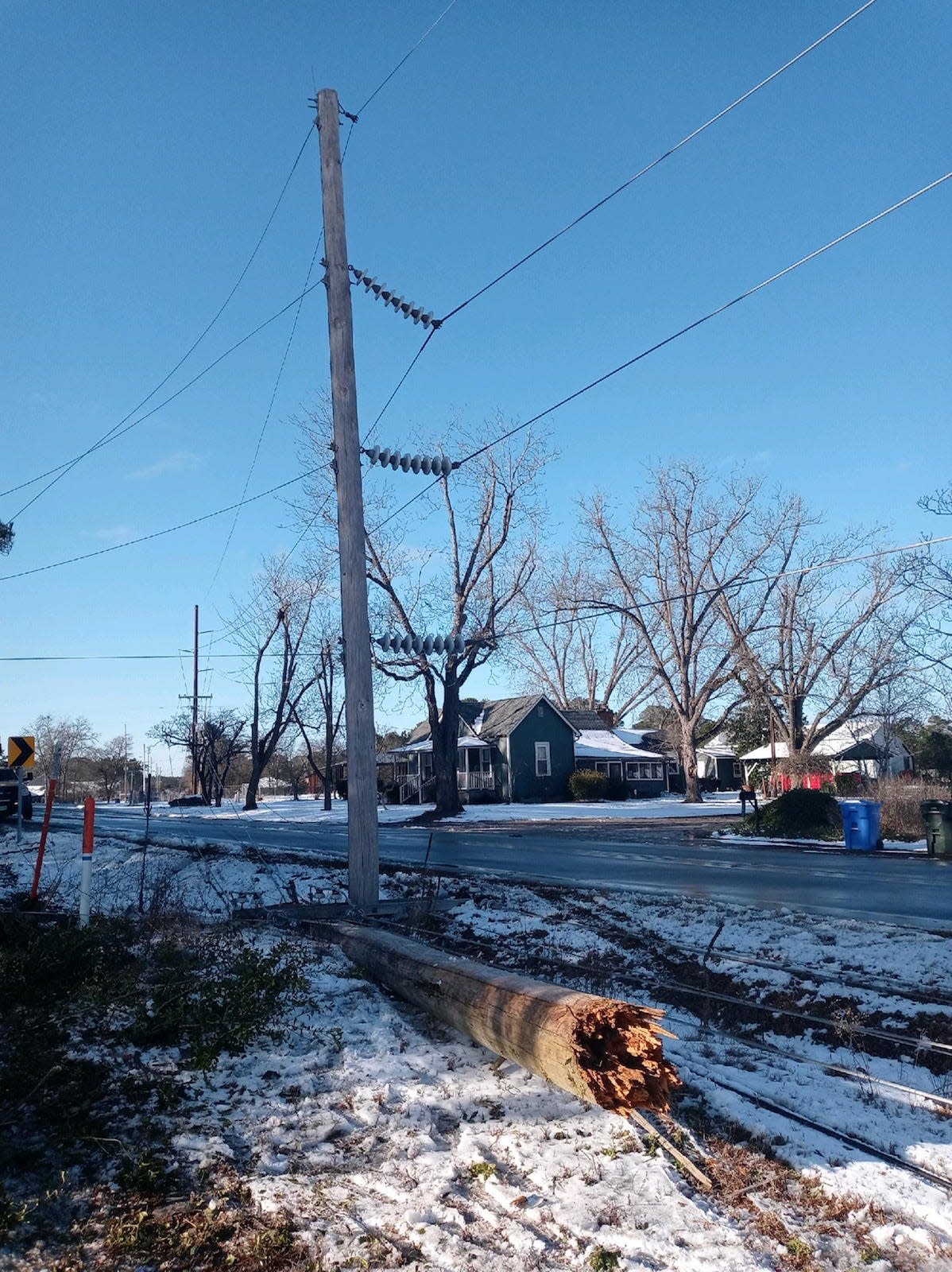 A  Lumbee River EMC transmission pole on Fisher Drive was struck by a truck early Saturday afternoon, knocking out electricity to more than 6,200 customers in Cumberland County.