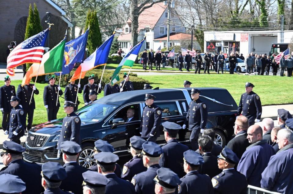 Diller, 31, was laid to rest after funeral services in Massapequa, following a two-day wake that drew hundreds of uniformed officers from throughout the nation. ZUMAPRESS.com