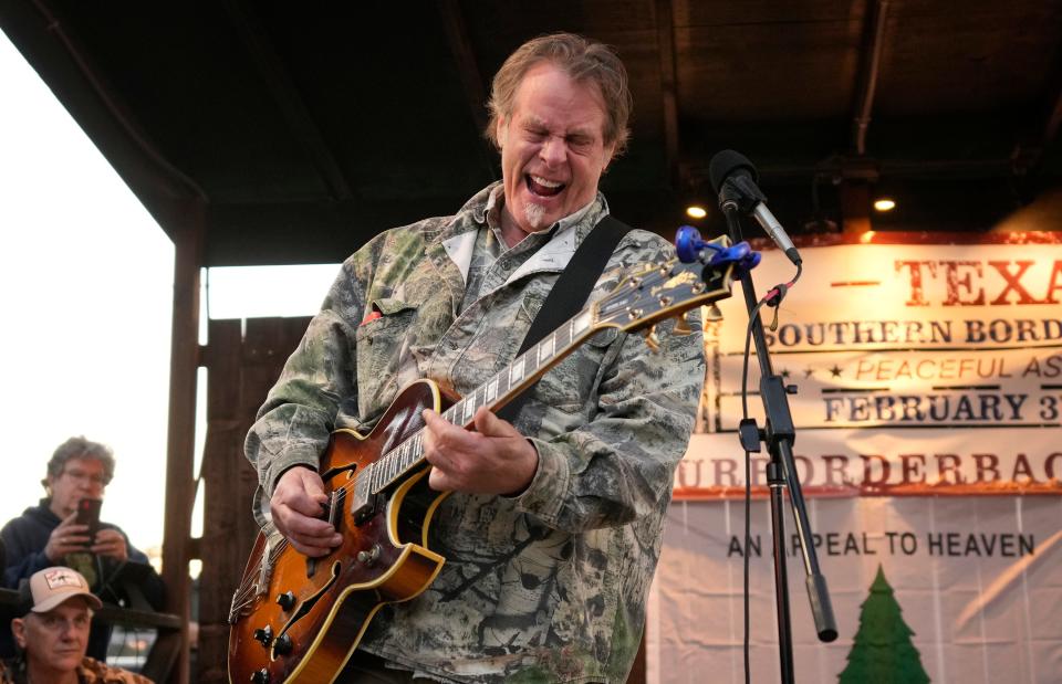 Rocker and political activist Ted Nugent plays the Star Spangled Banner at the Take Our Border Back Convoy rally at One Shot Distillery and Brewery in Dripping Springs on Thursday February 1, 2024.