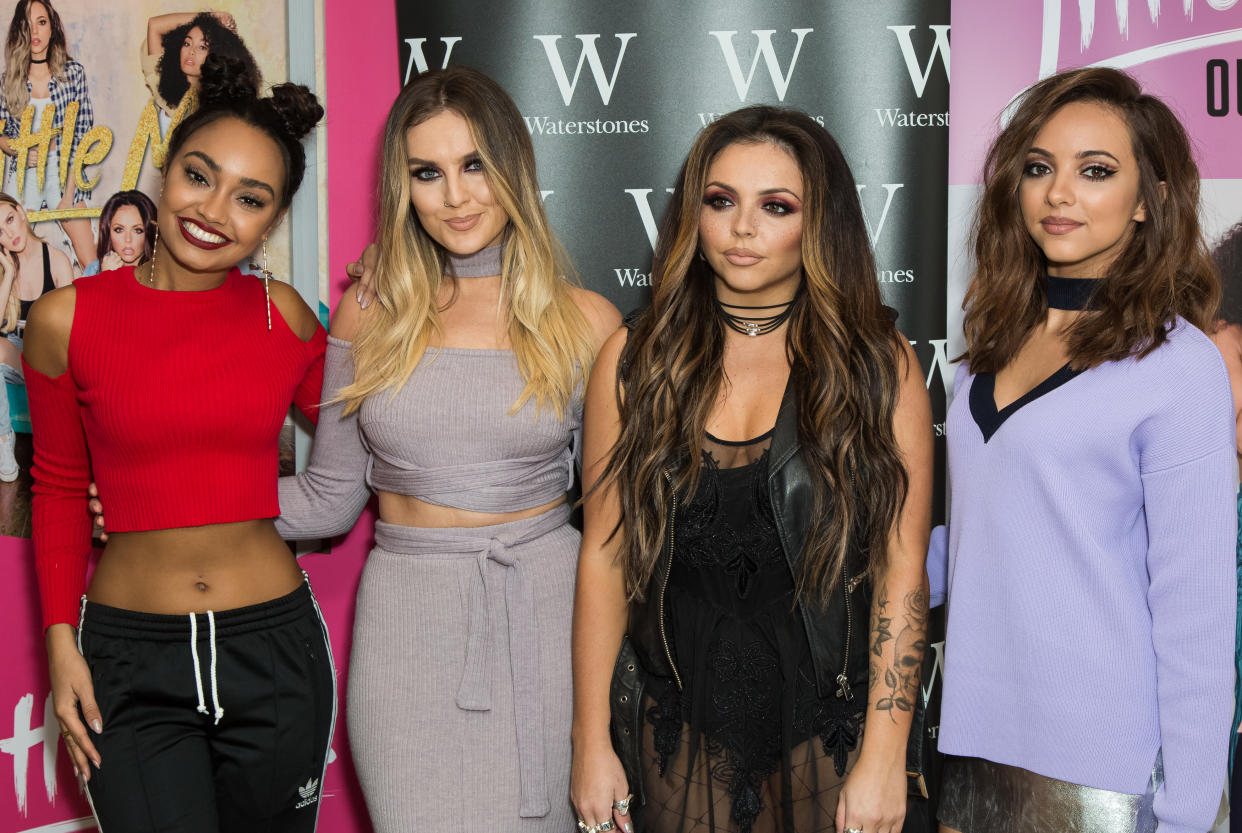 Band members of music group Little Mix, from left, Leigh-Anne Pinnock, Perrie Edwards, Jesy Nelson and Jade Thirlwall pose for photographers during a photo call before signing copies of their book ‘Our World’, in London, Saturday, Oct. 22, 2016. (Photo by Vianney Le Caer/Invision/AP)