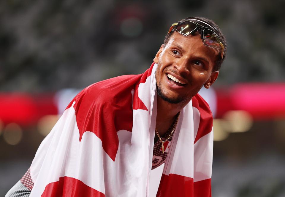 Andre De Grasse of Team Canada celebrates after winning the gold medal (Getty)