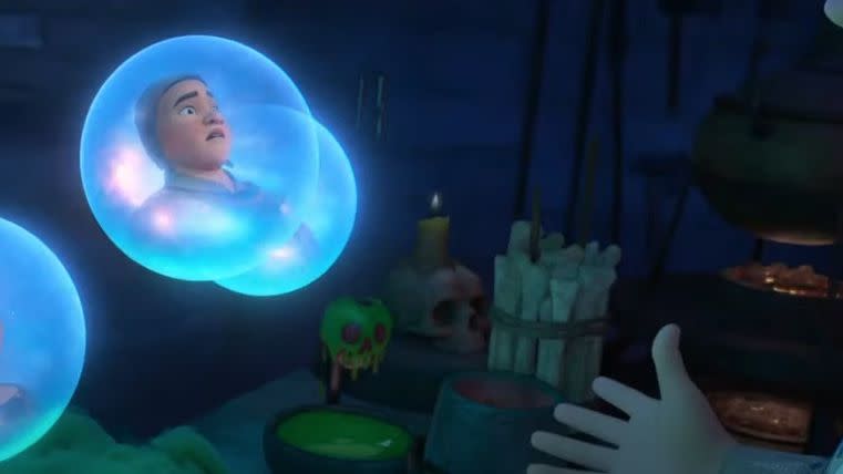 a group of bubbles full of wishes hover over king magnifico's desk, which has a poison apple on it, in a scene from wish in a room