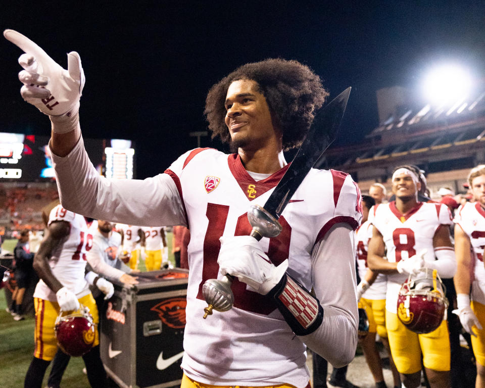 CORVALLIS, OR – SEPTEMBER 24: Linebacker Eric Gentry #18 of the USC Trojans points to the crowd after USCs 17-14 win over the Oregon State Beavers at Reser Stadium on September 24, 2022 in Corvallis, Oregon. (Photo by <a class="link " href="https://sports.yahoo.com/ncaaw/players/68400" data-i13n="sec:content-canvas;subsec:anchor_text;elm:context_link" data-ylk="slk:Ali;sec:content-canvas;subsec:anchor_text;elm:context_link;itc:0">Ali</a> Gradischer/Getty Images)