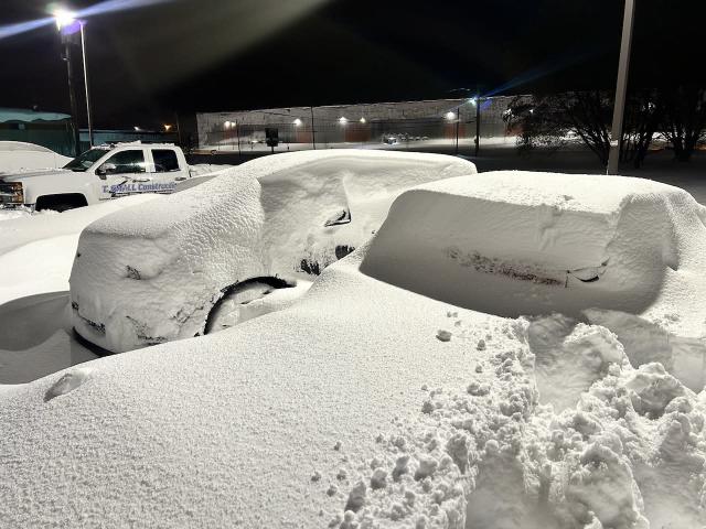 Massive snowfall buries cars, keeps falling in western NY