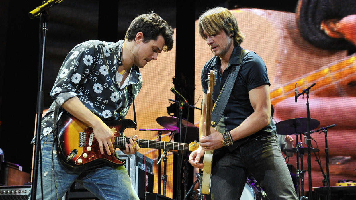  John Mayer and Keith Urban onstage in 2013 