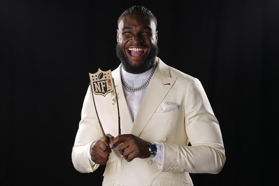 FILE - Houston Texans' Will Anderson Jr., AP defensive rookie of the year, poses after winning the award at the NFL Honors award show ahead of the Super Bowl 58 football game Thursday, Feb. 8, 2024, in Las Vegas. Will Anderson Jr. is back at the NFL draft. Anderson and New Orleans Saints edge rusher Chase Young joined Klutch Athletics founder Rich Paul this week for the reveal of New Balance’s first football cleats.(AP Photo/Matt York)