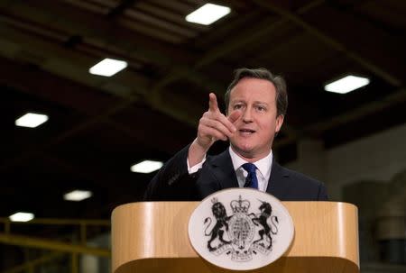 Britain's Prime Minister David Cameron delivers a speech at JCB World Headquarters in Rocester, central England November 28, 2014. REUTERS/Oli Scarff/Pool