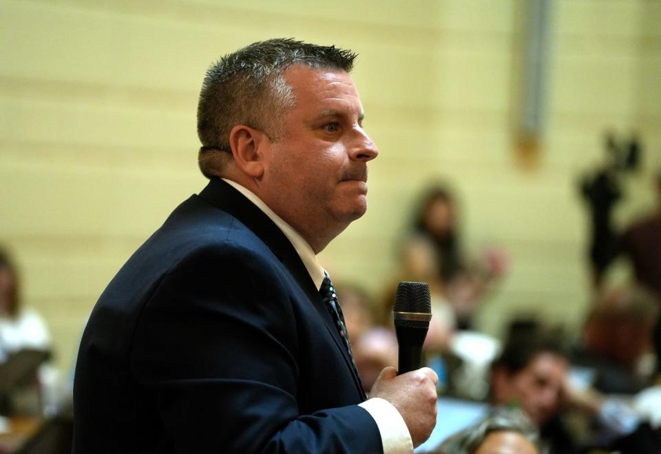 Rep. Scott Slater listens to questions on the House floor Tuesday evening about his bill to legalize adult recreational use of marijuana.