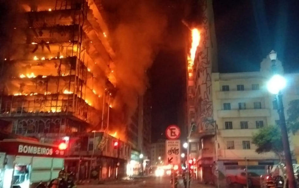 Firefighters worked through the night as flames engulfed the abandoned building. (Sao Paulo Fire Department via AP)