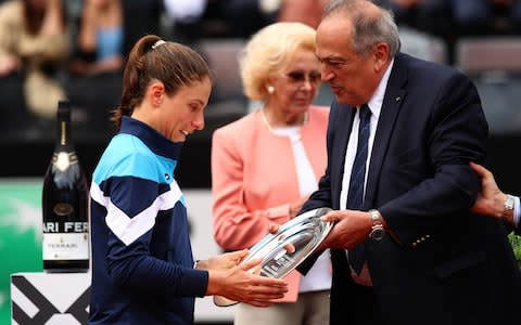 Johanna Konta of Great Britain receives her runners up trophy after her straight sets defeat against Karolina Pliskova of the Czech Republic in the women's final during day eight of the International BNL d'Italia at Foro Italico on May 19, 2019 in Rome, Italy - Credit: Getty Images