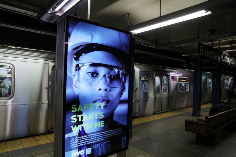 FILE PHOTO: A digital public safety notice illuminates near where Jordan Neely was placed in a chokehold by a fellow passenger on a New York City subway train