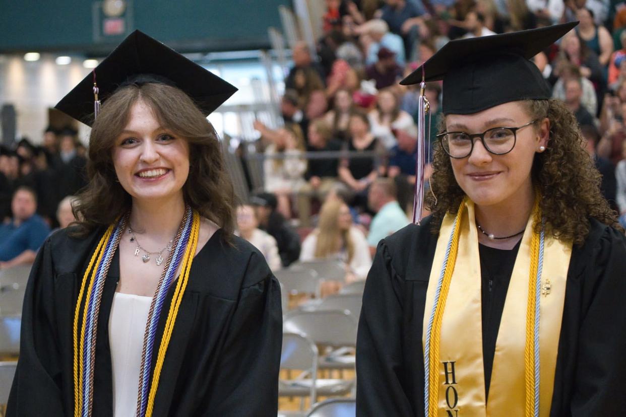 Riley Burns, left, and Kennedy Bowling delivered speeches at MCCC’s 57th annual commencement ceremony. Burns spoke of the importance of making connections. Bowling advocated for kindness.