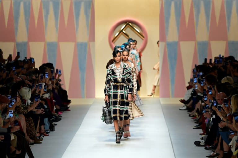 Fendi's latest collection boasts gauzy skirts and coats in colours of ocean blue, seafoam green and coral pink