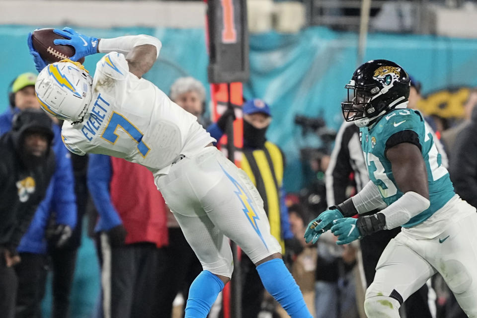Los Angeles Chargers tight end Gerald Everett (7) makes the catch against the Jacksonville Jaguars during the second half of an NFL wild-card football game, Saturday, Jan. 14, 2023, in Jacksonville, Fla. (AP Photo/Chris Carlson)