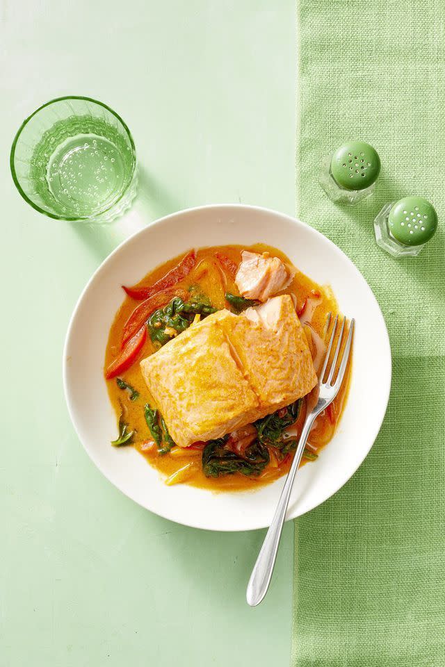 <p>If you've never tried poaching your salmon in coconut milk, now's the time to try it. The perfect combination of sweet and spicy flavors in this dish will satisfy any curry-lover.</p><p><em><a href="https://www.womansday.com/food-recipes/food-drinks/a22690236/curry-poached-salmon-with-peppers-recipe/" rel="nofollow noopener" target="_blank" data-ylk="slk:Get the Curry-Poached Salmon with Peppers recipe.;elm:context_link;itc:0;sec:content-canvas" class="link ">Get the Curry-Poached Salmon with Peppers recipe.</a></em></p>