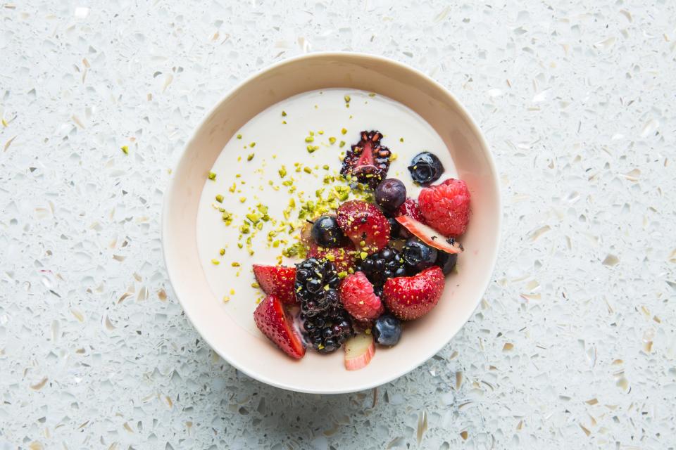 Berries with Tea-Infused Cream and Pistachios