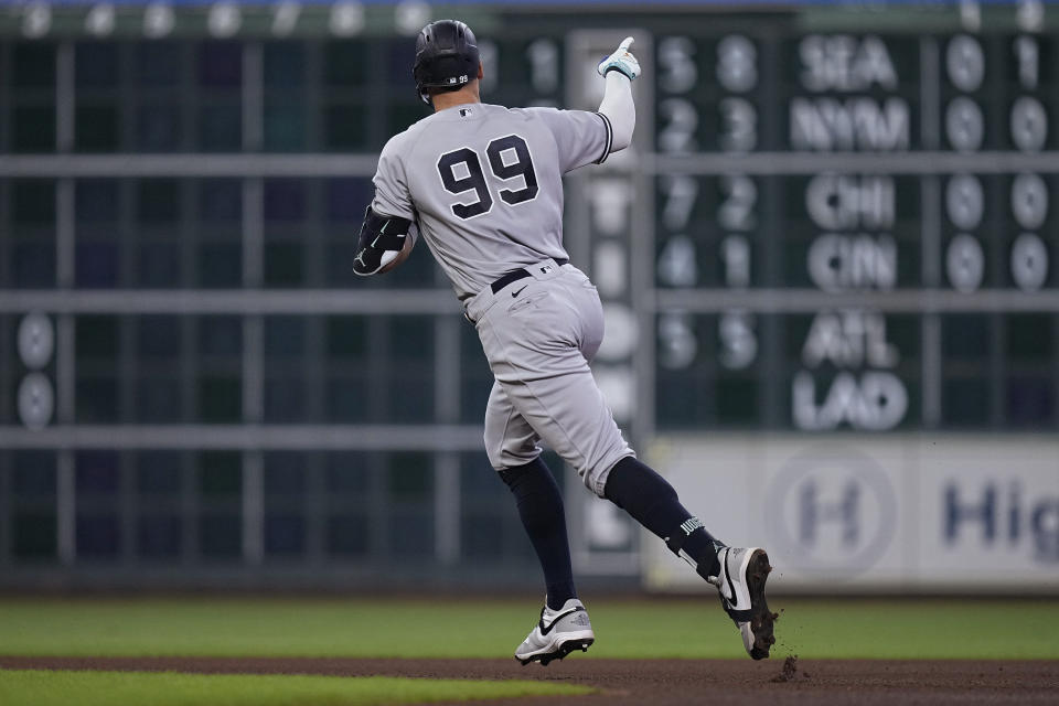 New York Yankees' Aaron Judge runs the bases after hitting a solo home run against the Houston Astros during the third inning of a baseball game Saturday, Sept. 2, 2023, in Houston. (AP Photo/Kevin M. Cox)