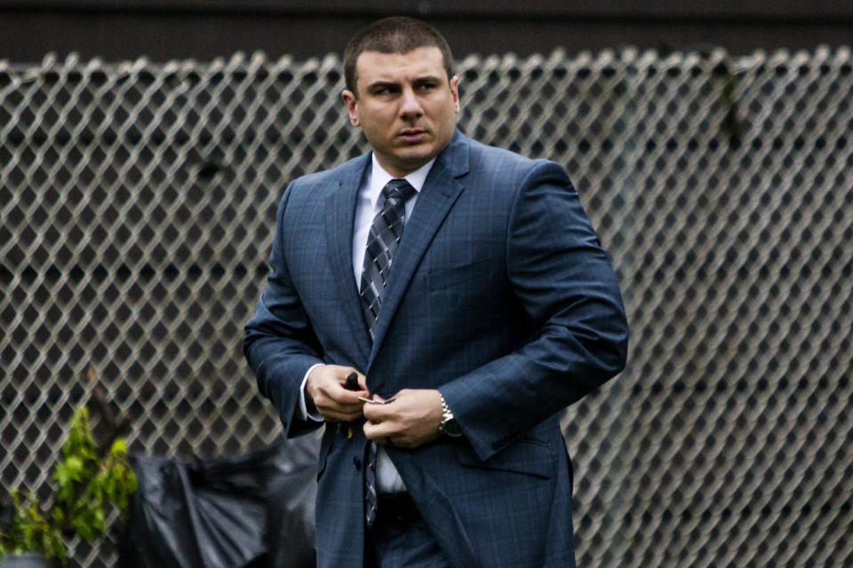 New York City police officer Daniel Pantaleo leaves his house Monday, May 13, 2019, in Staten Island, N.Y. A long-delayed disciplinary trial began Monday for Pantaleo, accused of using a banned chokehold in the July 2014 death of Eric Garner. (AP Photo/Eduardo Munoz Alvarez)