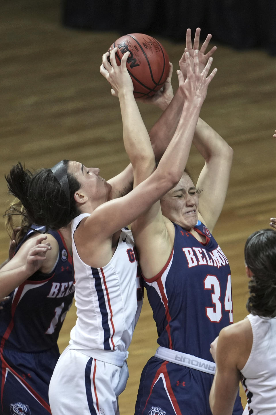 Belmont's Cam Browning (34) and Gonzaga's Jenn Wirth (3) reach for a rebound during the second half of a college basketball game in the first round of the NCAA women's tournament at University Events Center in San Marcos, Texas, Monday, March 22, 2021. (AP Photo/Chuck Burton)