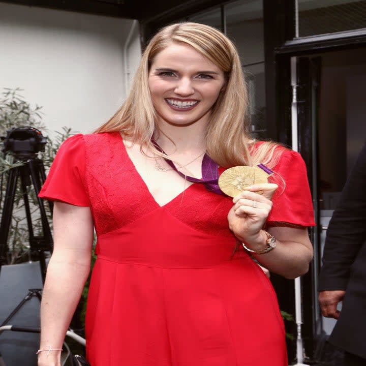 Missy holding a medal