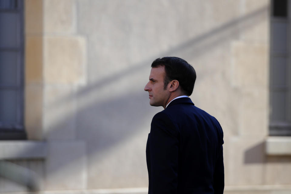 French President Emmanuel Macron arrives to deliver a speech at the Ecole Militaire Friday, Feb. 7, 2020 in Paris. French President Emmanuel Macron, who leads the European Union's only post-Brexit nuclear power, on Friday advocated a more coordinated EU defense strategy in which France, and its arsenal, would hold a central role. (AP Photo/Francois Mori)