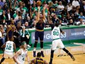 May 25, 2017; Boston, MA, USA; Cleveland Cavaliers forward Kevin Love (0) attempts a three point shot past Boston Celtics forward Amir Johnson (90) during the third quarter of game five of the Eastern conference finals of the NBA Playoffs at the TD Garden. Mandatory Credit: Greg M. Cooper-USA TODAY Sports