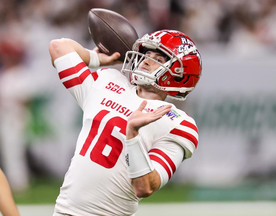 Dec 18, 2021; New Orleans, LA, USA;  Louisiana-Lafayette Ragin Cajuns quarterback Chandler Fields (16) passes the ball during warmups against Marshall Thundering Herd before the 2021 New Orleans Bowl at Caesars Superdome. Mandatory Credit: Stephen Lew-USA TODAY Sports