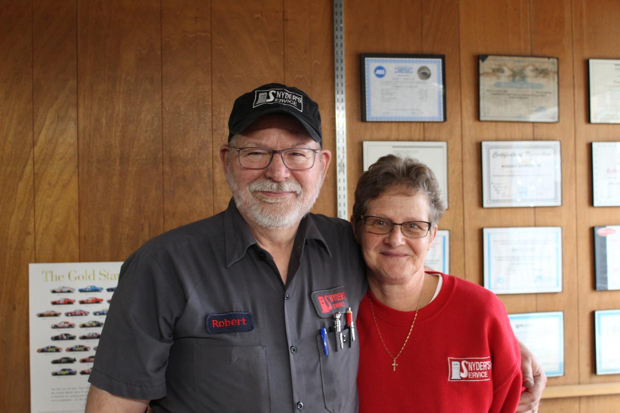 Robert (left) and Kim (right) Snyder have seen their fair share of challenges while running Snyder's Service, including a flood in 2011 that filled the business with over three feet of water.