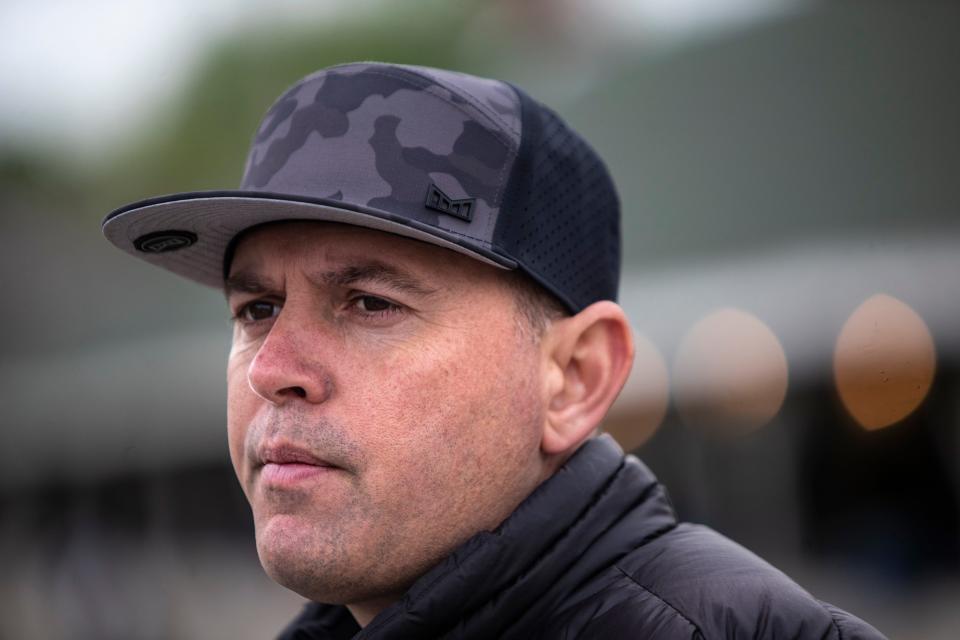 Trainer Chad Brown talks with the media on the backside at Churchill Downs about his Kentucky Derby prospect, Zandon, on April 29, 2022.