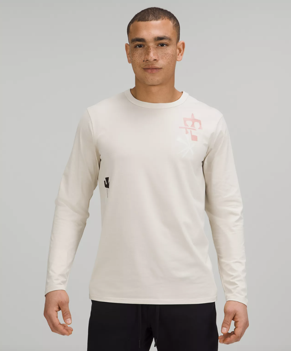 man in long sleeve white t-shirt Team Canada The Fundamental Long Sleeve Shirt (Photo via Lululemon)