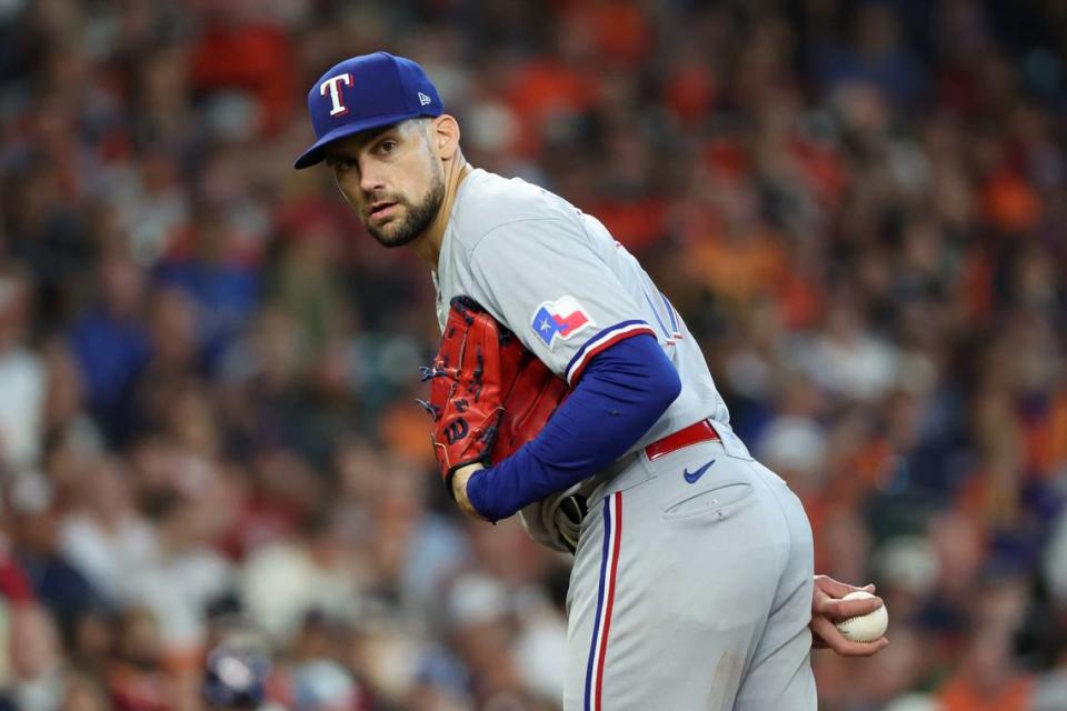 Texas Rangers starting pitcher Nathan Eovaldi prepares to pitch in the sixth inning against the Houston Astros during game two of the ALCS for the 2023 MLB playoffs at Minute Maid Park.