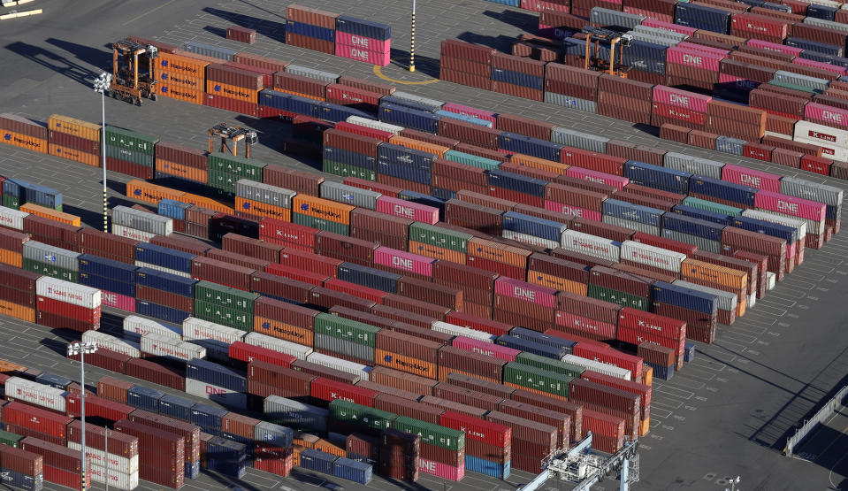 FILE - In this March 5, 2019, file photo, cargo containers are staged near cranes at the Port of Tacoma, in Tacoma, Wash. Some are moving factories out of China. Others are strategically redesigning products. Some are seeking loopholes in trade law or even mislabeling where their goods originate, all with the goal of evading President Donald Trump’s sweeping tariffs on goods from China. (AP Photo/Ted S. Warren, File)