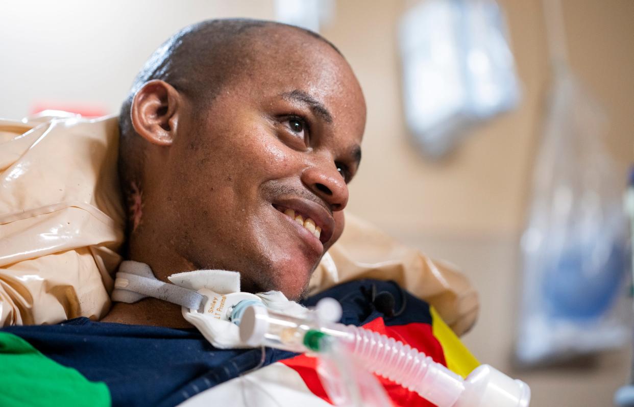 Kassim Omar smiles, a common occurrence when her friend and advocate Lara Downing visits her in her Columbus area nursing home. Omar, 29, was paralyzed when she was shot in 2022 outside Wedgewood Village Apartments.