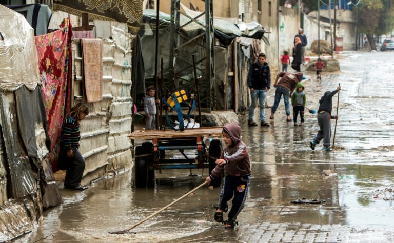 A street after rainfall in Beit Lahia, Gaza, where radical changes in behaviour are needed to improve water quality, including storing rainwater and reusing water