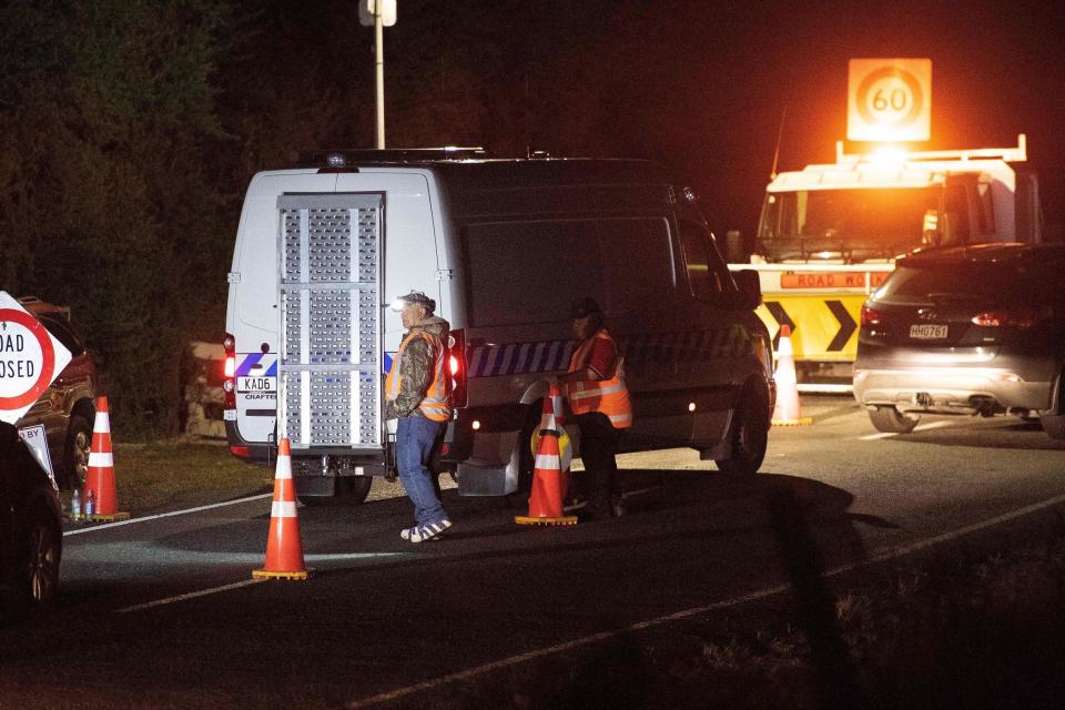 A police van arrives at Whakatane airport to help with the removal of the eight bodies on White Island (AFP via Getty Images)