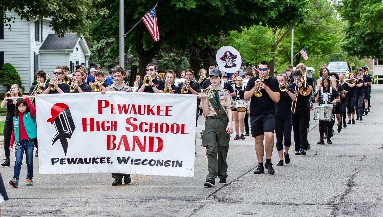 The Pewaukee High school Band performs in the Pewaukee Memorial Day parade on Monday, May 27, 2019.