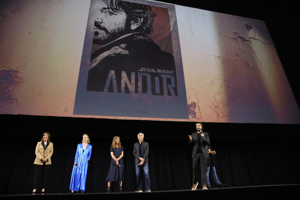 “Andor’ star Diego Luna unveils a new post at Star Wars Celebration alongside Lucasfilm president Kathleen Kennedy, “Andor” co-star Genevieve O’Reilly, exec. producer Sanne Wohlenberg and director Tony Gilroy. - Credit: Jesse Grant/Getty Images for Disney