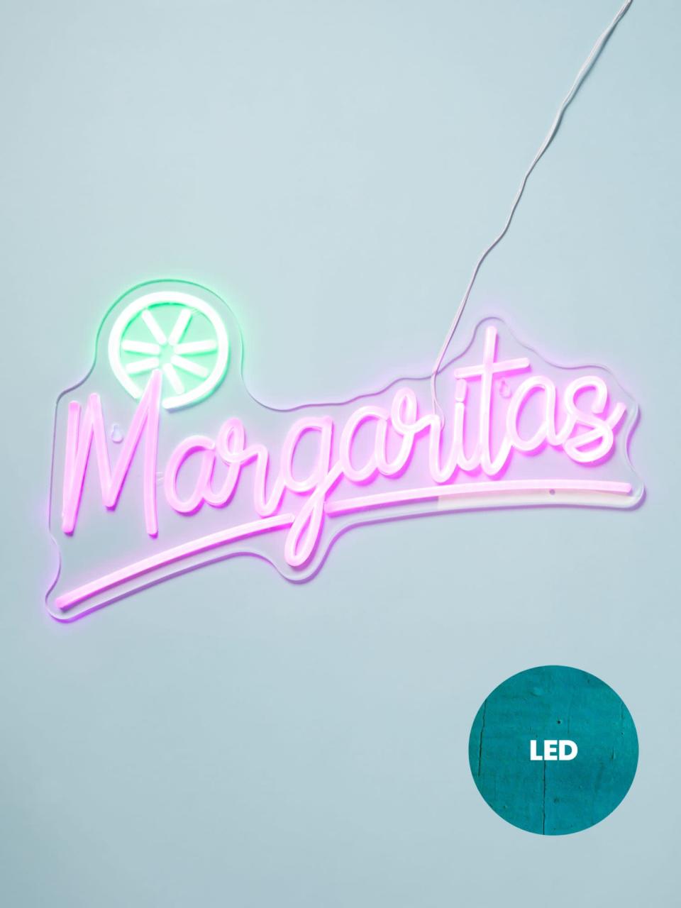<p>If you have a bar area in your home and love tequila, chances are this <span>Neon Led Margaritas Sign</span> ($70) will fit right in. Its playful look will add personality to your home, and it can be plugged in wherever an outlet is available. Find a good margarita recipe online, and you'll be all set for a drink. </p>