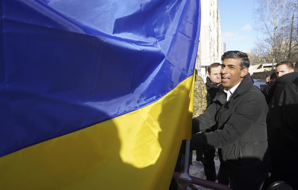 Prime Minister Rishi Sunak talks to members of the publicin Kyiv, Ukraine, ahead of meeting with President Volodymyr Zelenskyy to announce a major new package of military aid to Ukraine, Friday, Jan. 12, 2024. (Stefan Rousseau/Pool via AP)