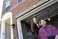 Major Steve Sucharski, US Army retired, has his daughter Kyra Sucharski cut his hair outside of their home in Laurel, Md., Sunday, April 19, 2020. Sucharski takes comfort in keeping his hair high and tight and is used to getting his hair trimmed every pay period, or every two weeks. Sucharski says it been, "at least 3 pay periods, I'm at Chia pet phase." So, he talked his daughter Kyra, a 4th Class cadet at the University of Delaware, into doing the honors. Soldiers in the field often have to cut each other's hair, so Sucharski thought the experience might good for his daughter who is graduating. Since barbershops and hair salon's are closed because of the coronavirus pandemic, some people are letting those in their isolation bubble cut their hair. (AP Photo/Susan Walsh)