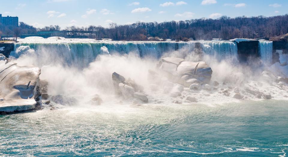 Mist and rocks are gathered at the base of the American Falls as seen in 2014.