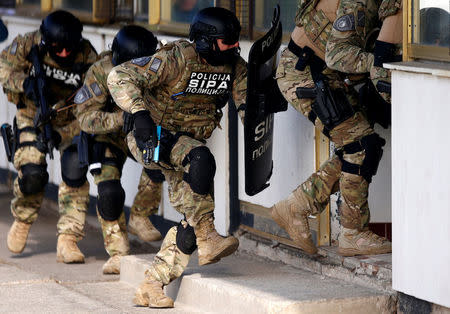 Participants of the European Union Force (EUFOR), Armed Forces, Border Police and State Investigation and Protection Agency (SIPA) of Bosnia and Herzegovina practice an anti-terrorism situation during an exercise at the Sarajevo International Airport, Bosnia and Herzegovina October 13, 2017. REUTERS/Dado Ruvic