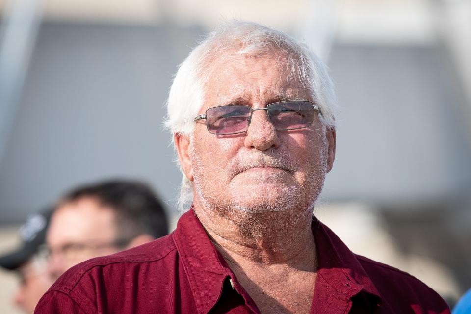 Larry Mayfield, the nephew of WWII U.S. Army Air Force Sgt. Herald Ray Boyd, watches his uncle's remains be offloaded from an airplane at Corpus Christi International Airport on Friday, Sept. 9, 2022, in Texas.