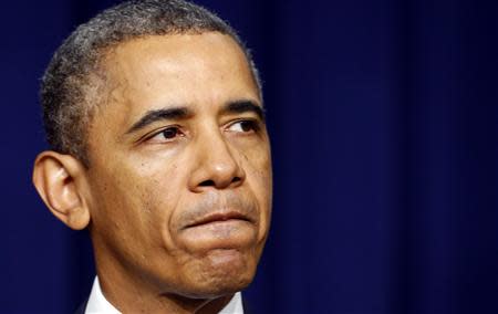 U.S. President Barack Obama speaks from the White House about the shootings at the U.S. Navy Yard in Washington September 16, 2013. REUTERS/Kevin Lamarque