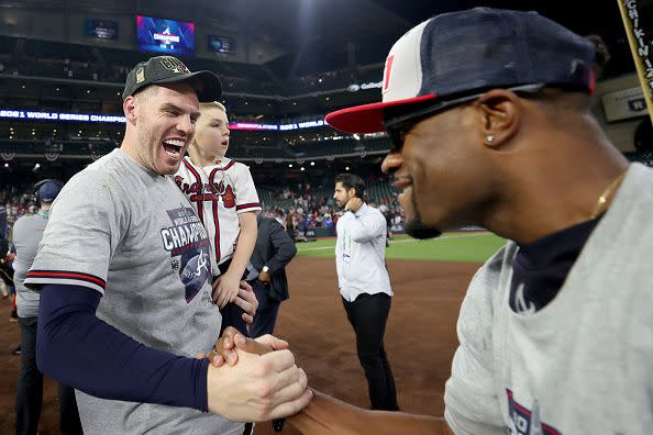 HOUSTON, TEXAS - NOVEMBER 02:  Freddie Freeman #5 of the Atlanta Braves celebrates after the team's 7-0 victory against the Houston Astros in Game Six to win the 2021 World Series at Minute Maid Park on November 02, 2021 in Houston, Texas. (Photo by Carmen Mandato/Getty Images)